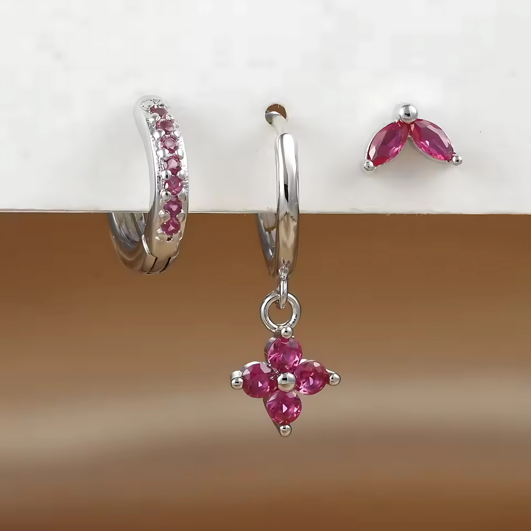 Insieme di Orecchini e Piercing – Versatilità e Sottile Brillantezza 