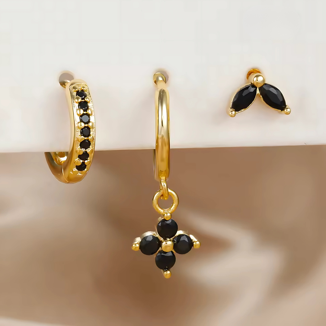 Insieme di Orecchini e Piercing – Versatilità e Sottile Brillantezza 